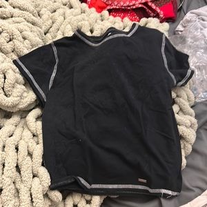 black baby tee with white stitching